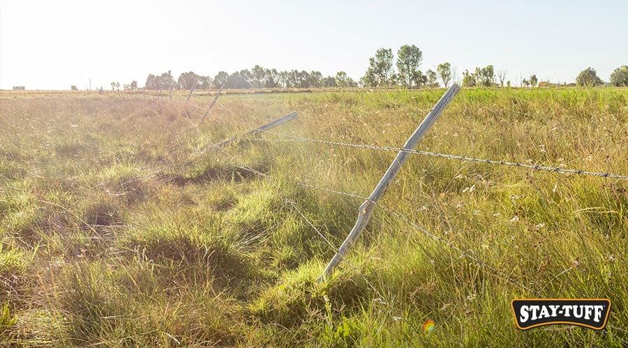 A leaning fence compromises the security of your area, fix it as soon as possible!